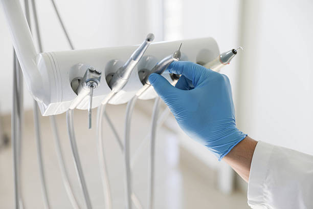 Professional Tooth Extraction technician working in Meadows Place, TX